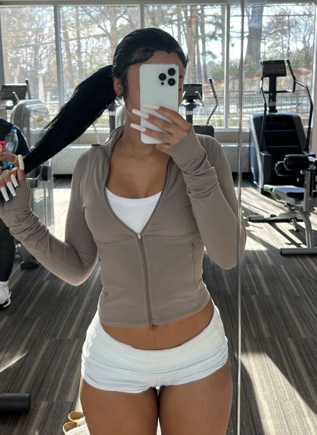 20 Baddie Gym Outfits That Will Make You the Main Character at Every Workout - 12. Taupe Zip Top and White Ruched Shorts 1