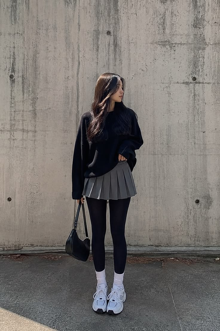 20 Black Tights Styling Tricks That Create a Longer, Sleeker Silhouette - 6. Pair Black Tights with Sneakers for a Sporty Petite Outfit 1