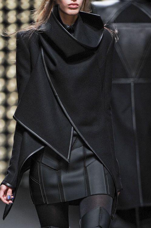20 Designer Coats That Will Make Your Winter Wardrobe Look Instantly More Luxurious - 15. The Sculpted Gray Peplum Coat With Retro Glamour 1