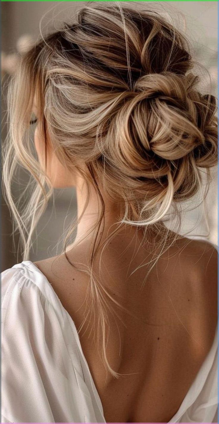 20 Elegant Messy Updos That Are Perfect for Prom, Parties, and Special Events - 9. The Highlighted Ribbon Bun 1