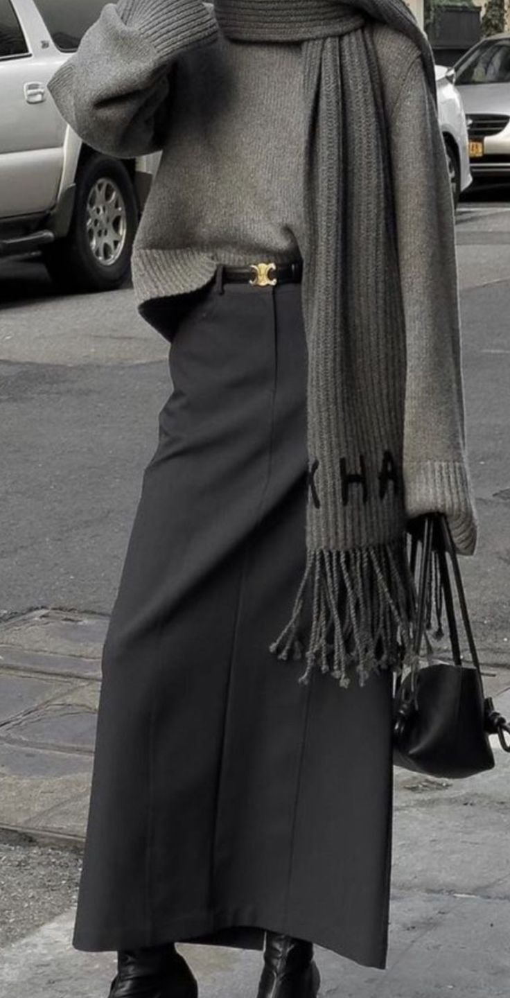 20 Maxi Skirt Outfits That Make Winter Style Feel Effortlessly Feminine (You’ll Want to Copy #7!) - 18. Gray Layers With a Black Satin Skirt 1