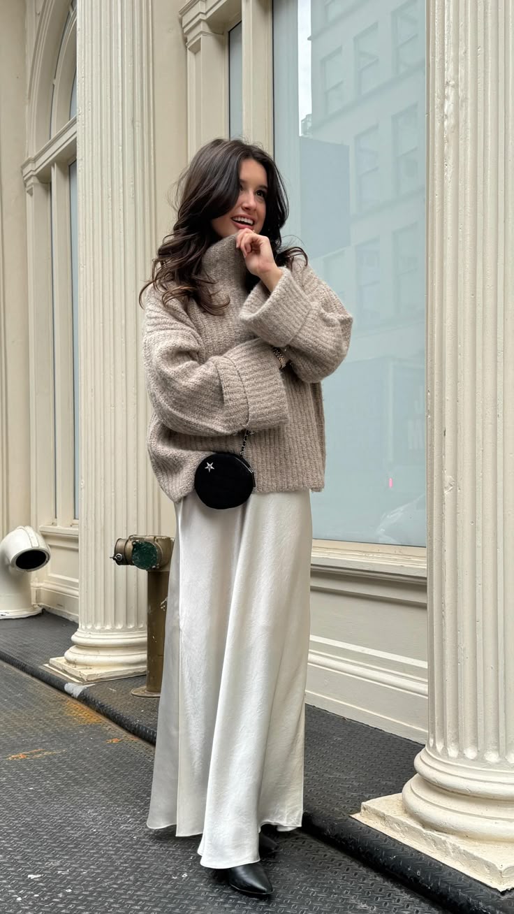 20 Maxi Skirt Outfits That Make Winter Style Feel Effortlessly Feminine (You’ll Want to Copy #7!) - 19. Winter White Satin and a Textured Sweater 1