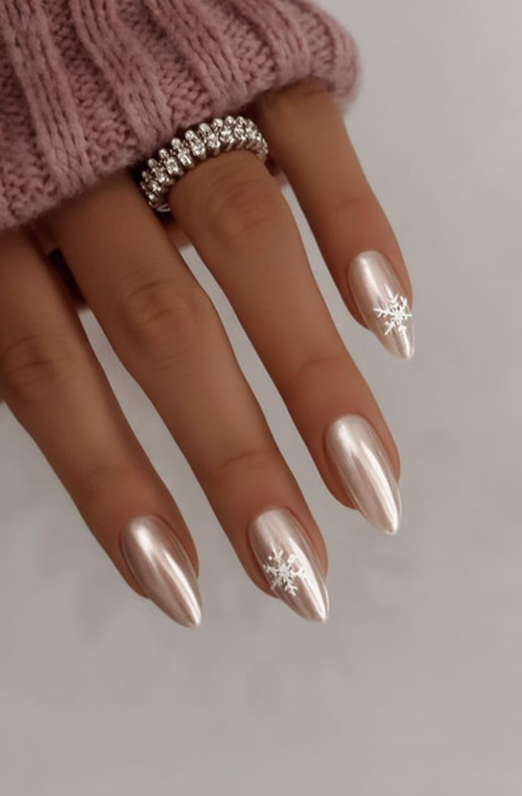 20 Stunning Winter Nail Designs That’ll Make Your Hands the Star of Every Holiday Party - 12. Pearl Chrome Snowflake Tips 1