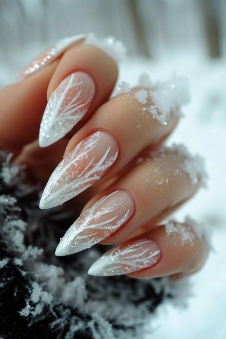 20 Stunning Winter Nail Designs That’ll Make Your Hands the Star of Every Holiday Party - 3. Frosted Glass Winter Wings 1