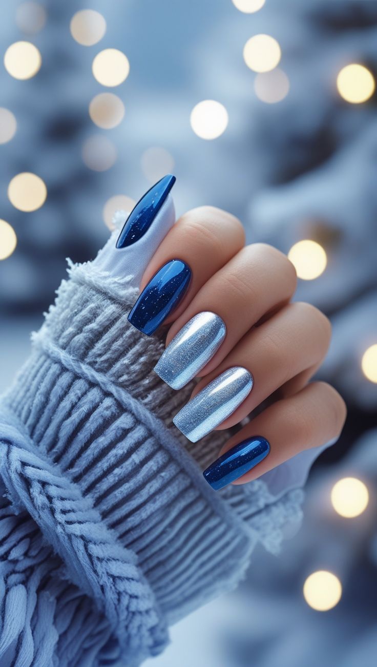 20 Stunning Winter Nail Designs That’ll Make Your Hands the Star of Every Holiday Party - 9. Midnight Blue and Silver Shine 1