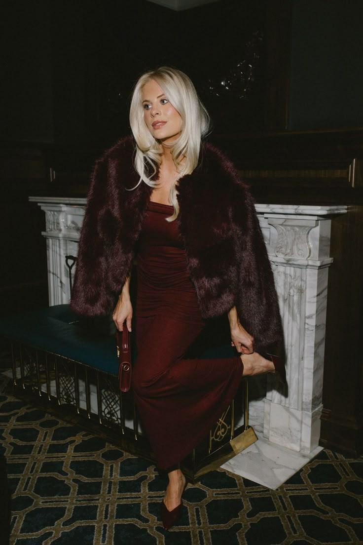 20 Winter Wedding Guest Dresses That Prove Cold Weather Style Can Be Absolutely Stunning! - 13. Wine Satin and a Plush Statement Jacket 1