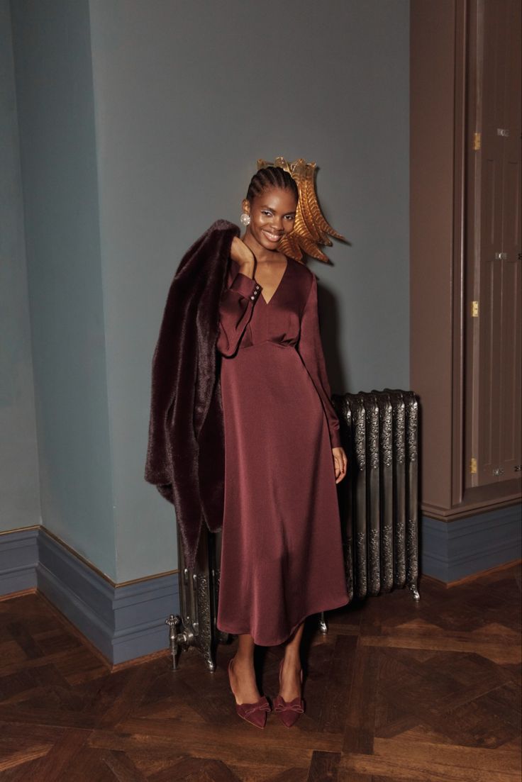 20 Winter Wedding Guest Dresses That Prove Cold Weather Style Can Be Absolutely Stunning! - 14. A Berry Midi with a Vintage Wrap Coat 1