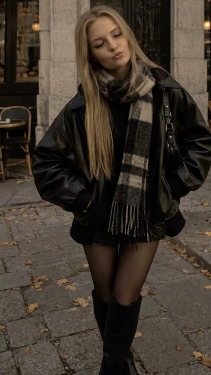 Christmas Market Outfits: 20 Warm, Photo-Ready Looks - 06. Glossy Black Jacket and Oversized Plaid Scarf 1