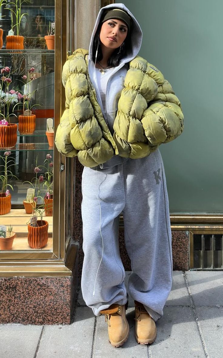 Puffer Jacket Outfits: 20 Ways to Look Chic in the Cold - 03. The Lime Puffer with a Full Gray Sweat Set 1