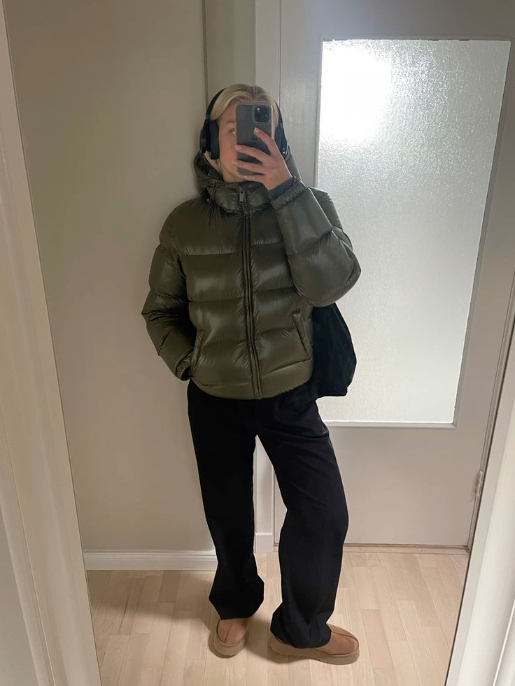 Puffer Jacket Outfits: 20 Ways to Look Chic in the Cold - 08. Olive and Black for a Quiet Minimal Look 1