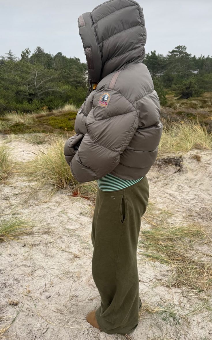 Puffer Jacket Outfits: 20 Ways to Look Chic in the Cold - 11. Taupe Puffer and Olive Fleece for a Nature Walk 1
