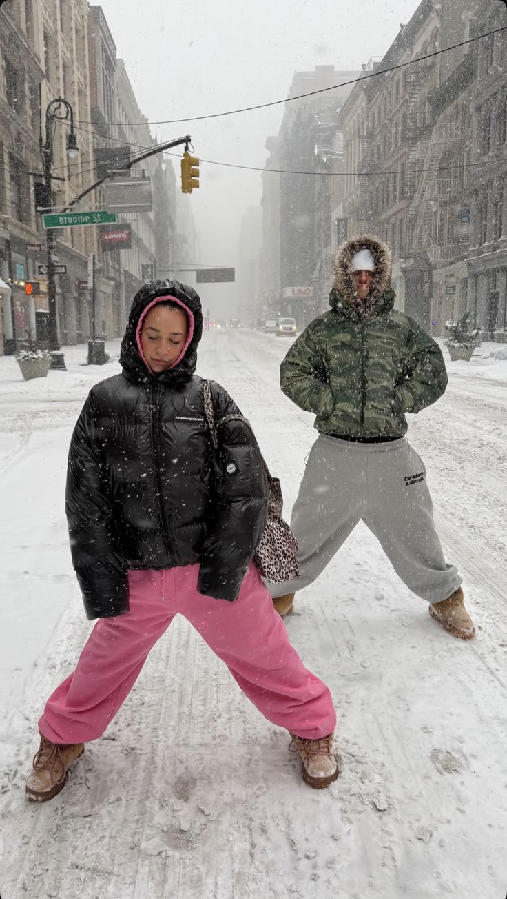 Puffer Jacket Outfits: 20 Ways to Look Chic in the Cold - 12. A Snowstorm Look with Pink Pants and Camo 1